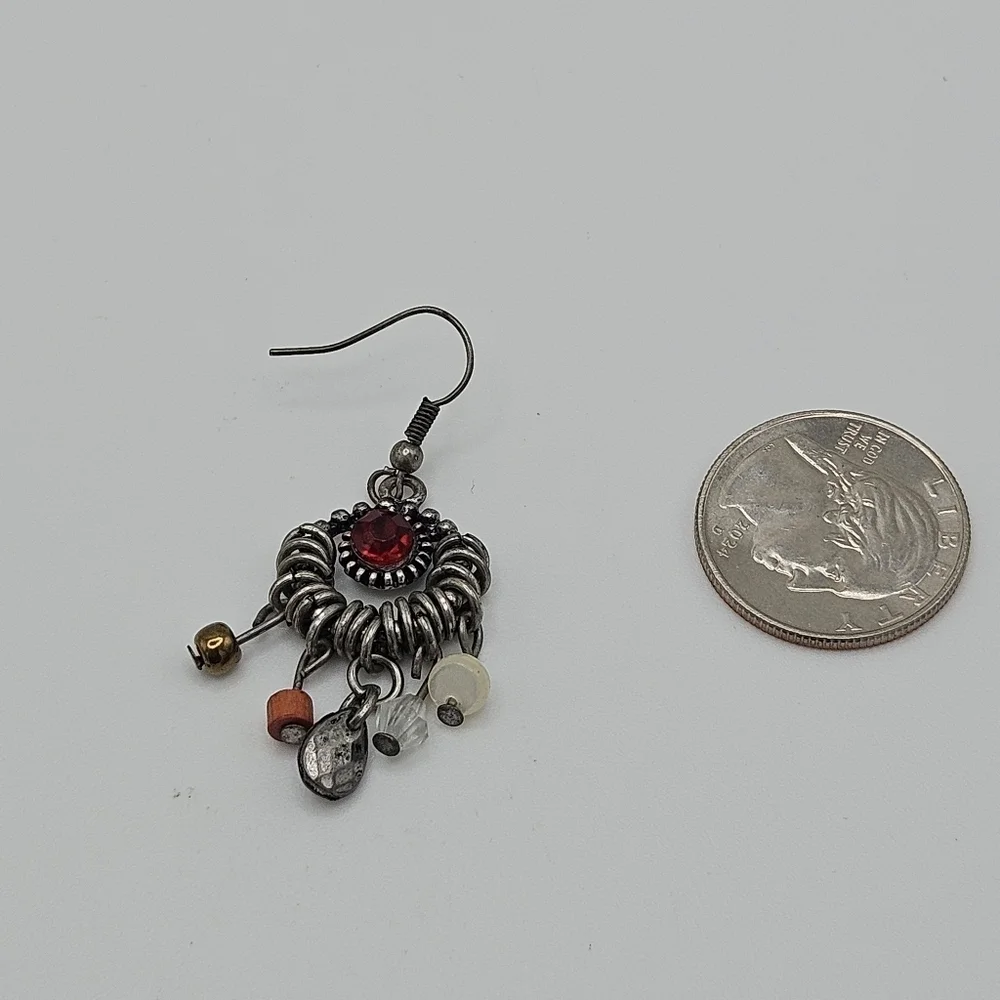 silver tone chandelier earrings with red center and beaded dangles